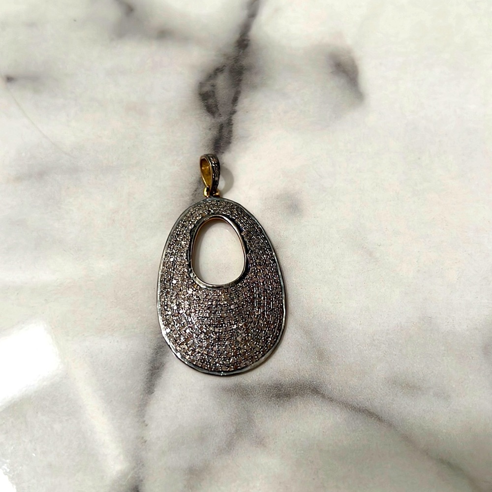 Gold and diamond charm